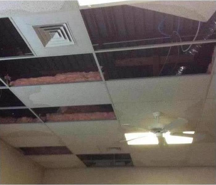 ceiling tiles removed due to roof leak and storm